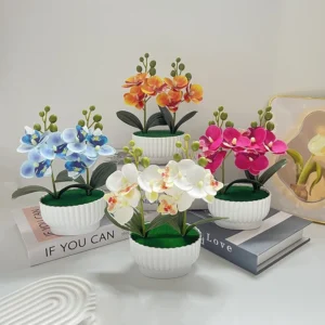 Two Sets Of Three Simulated Flowers